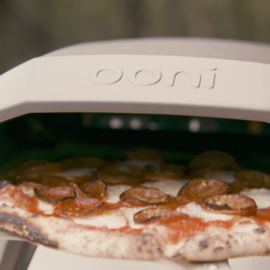 Surprise yourself with how fun a home pizza making party can be.