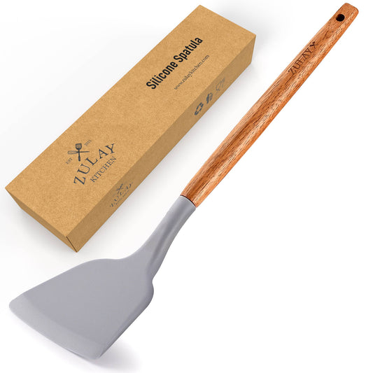 The silicone spatula is heat resistant to 428 degrees Fahrenheit.